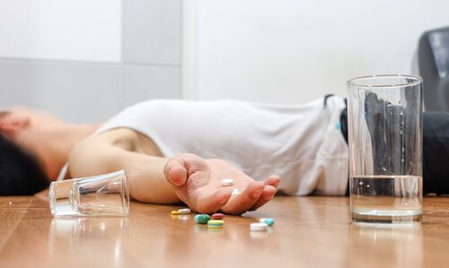overdosed teen lying on the floor