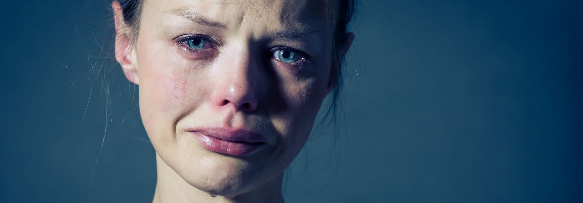 young woman in tears