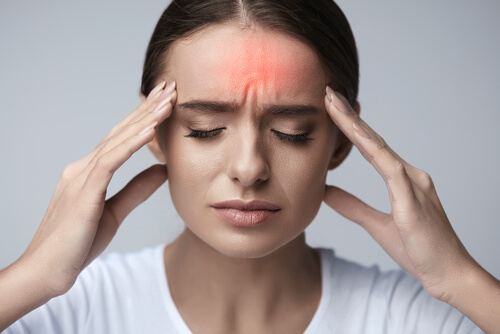 stressed woman with headache