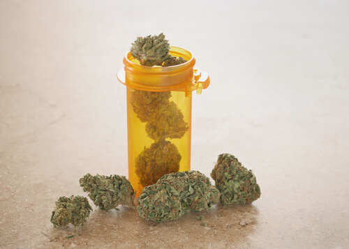 pill bottle filled with marijuana
