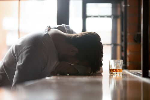 drunk man lay in the bar