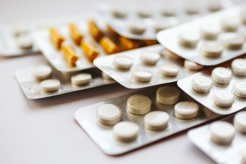 stack of different kinds of pills