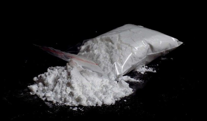 Cocaine spilled from the bag.