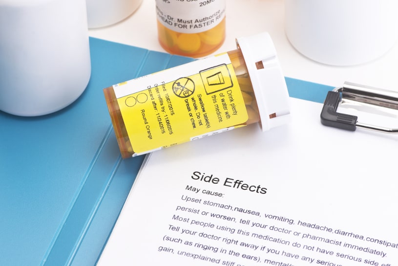 Sertraline prescription bottle with side effects information.