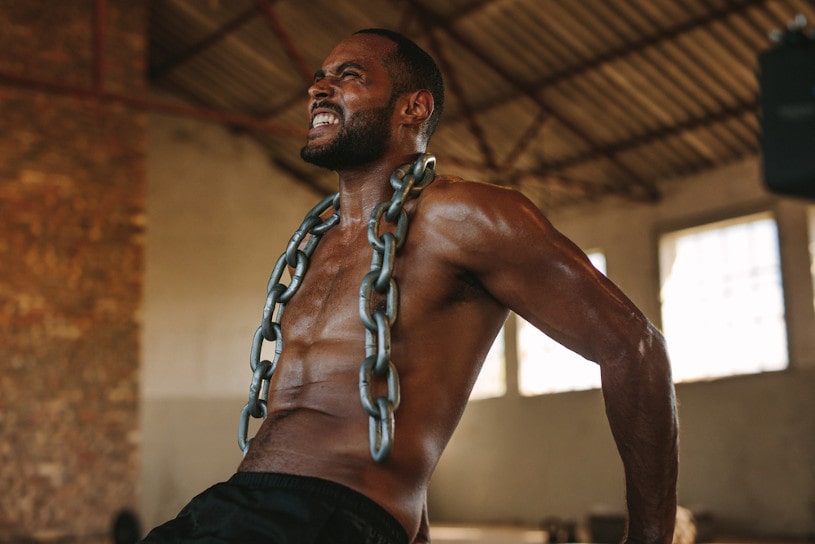 Man doing triceps dips exercise.