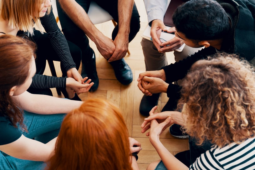 Support group, each participant sits in a circle.