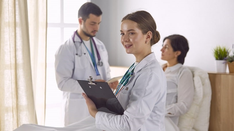 Doctors and patient in the hospital.