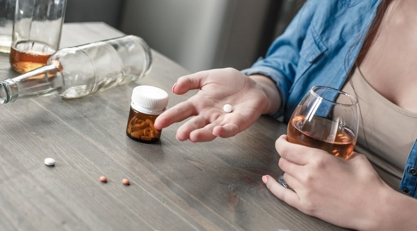 Woman taking phenibut with alcohol.