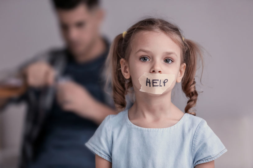 A child is asking for help, because her dad is drinking alcohol.