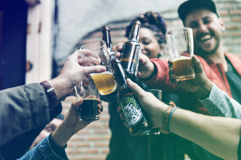 A group of young people drinking alcohol.