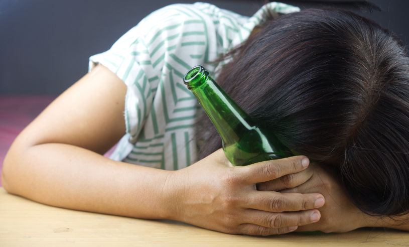 A woman is experiencing alcohol withdrawal symptoms.
