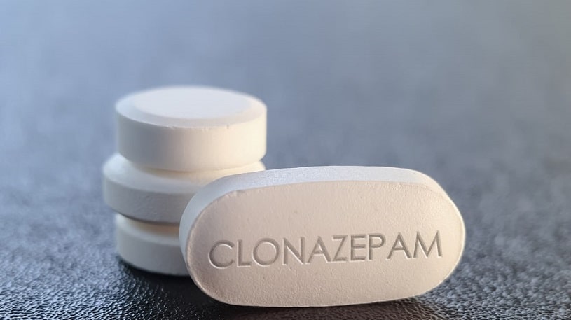 Clonazepam white pill on the table.