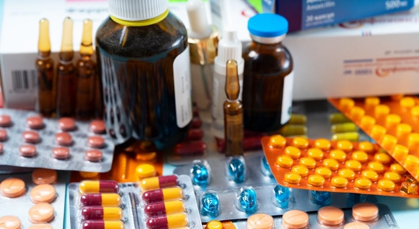 Various colorful pills and bottles.