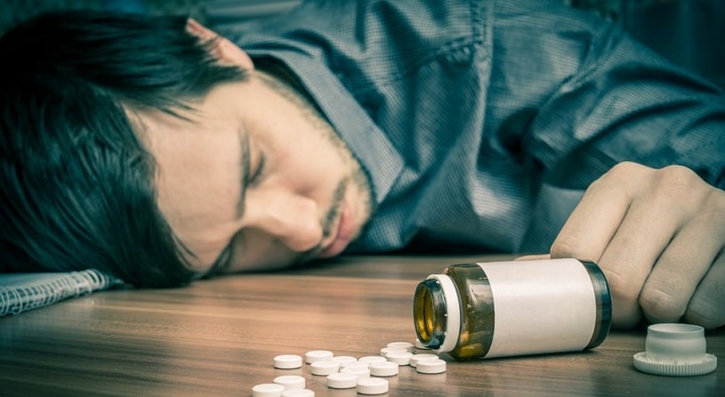 Man lying on the floor after Valium overdose.