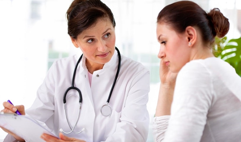 Doctor consulting a patient about Accutane usage.
