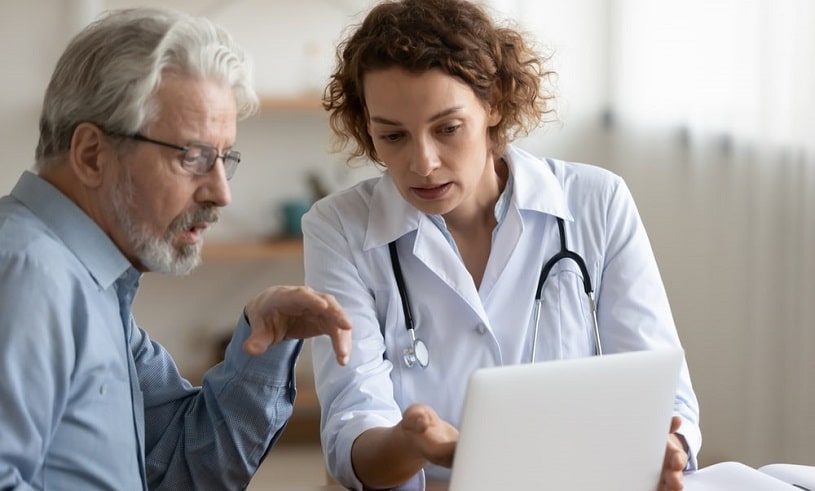 Physician explaining basics about Adderall and Strattera to a patient.