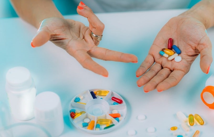 Female patient counting Librium pills.