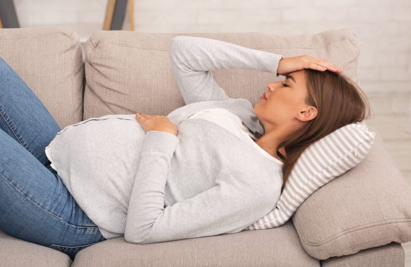 Pregnant woman is suffering from pain