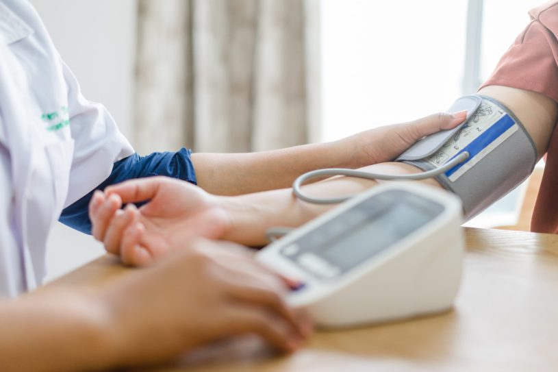 Doctor is measuring blood pressure