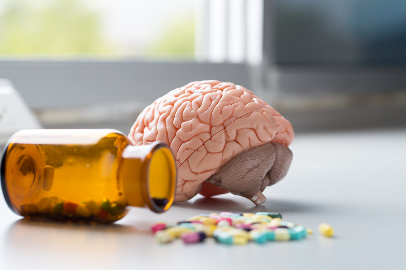 The Brain layout and some pills on the table.