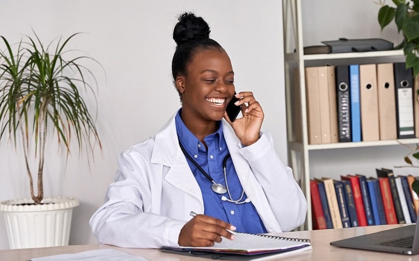 African american doctor talking on the phone.