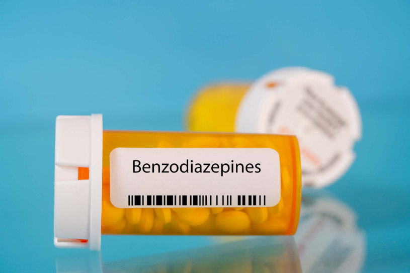 A yellow bottle with benzodiazepines drugs.